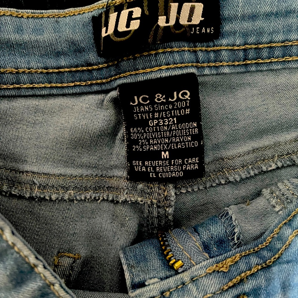 Light wash bell bottom jeans.